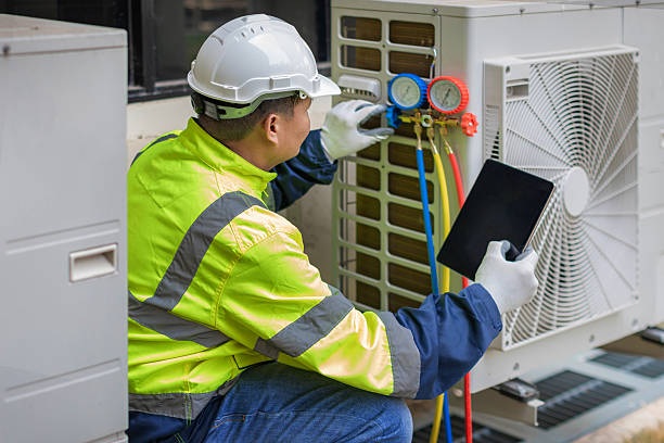 Professional Heat Pump Repair technician working in Enon, VA